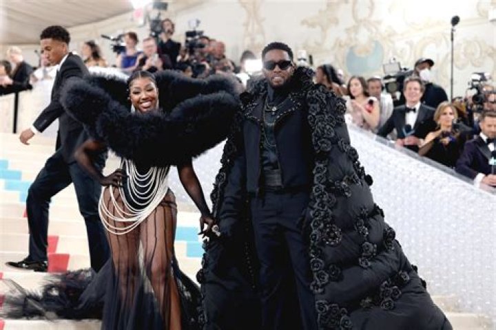 Unveiling the Elegance: Diddy in a White Suit
